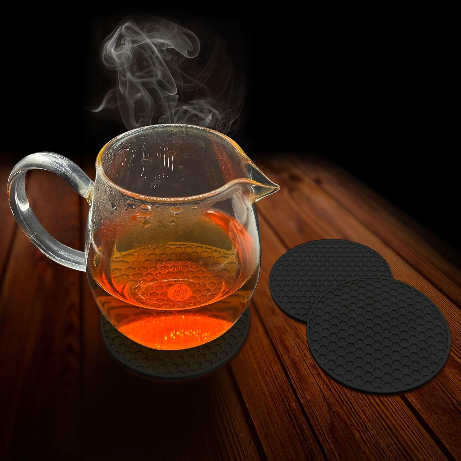 imageTENOC Silicone NonSlip Heat Resistant amp WaterTrapping Trivet Mats for Water Glasses amp Teacup amp Coffee Cup amp Dishes amp Cookware Multipurpose Kitchen Table Coaster 35Inch BlackBlack
