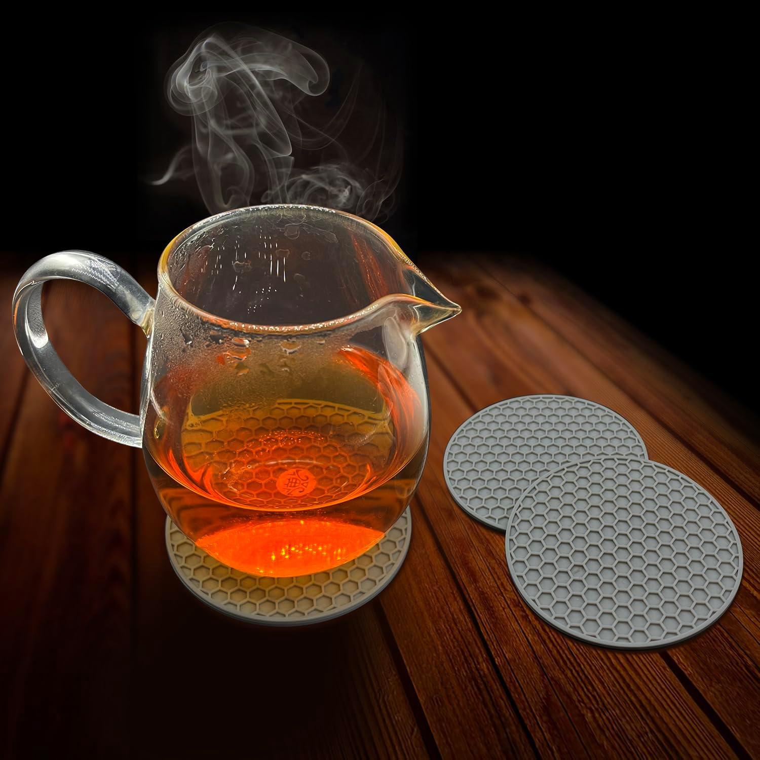 imageTENOC Silicone NonSlip Heat Resistant amp WaterTrapping Trivet Mats for Water Glasses amp Teacup amp Coffee Cup amp Dishes amp Cookware Multipurpose Kitchen Table Coaster 35Inch BlackGray