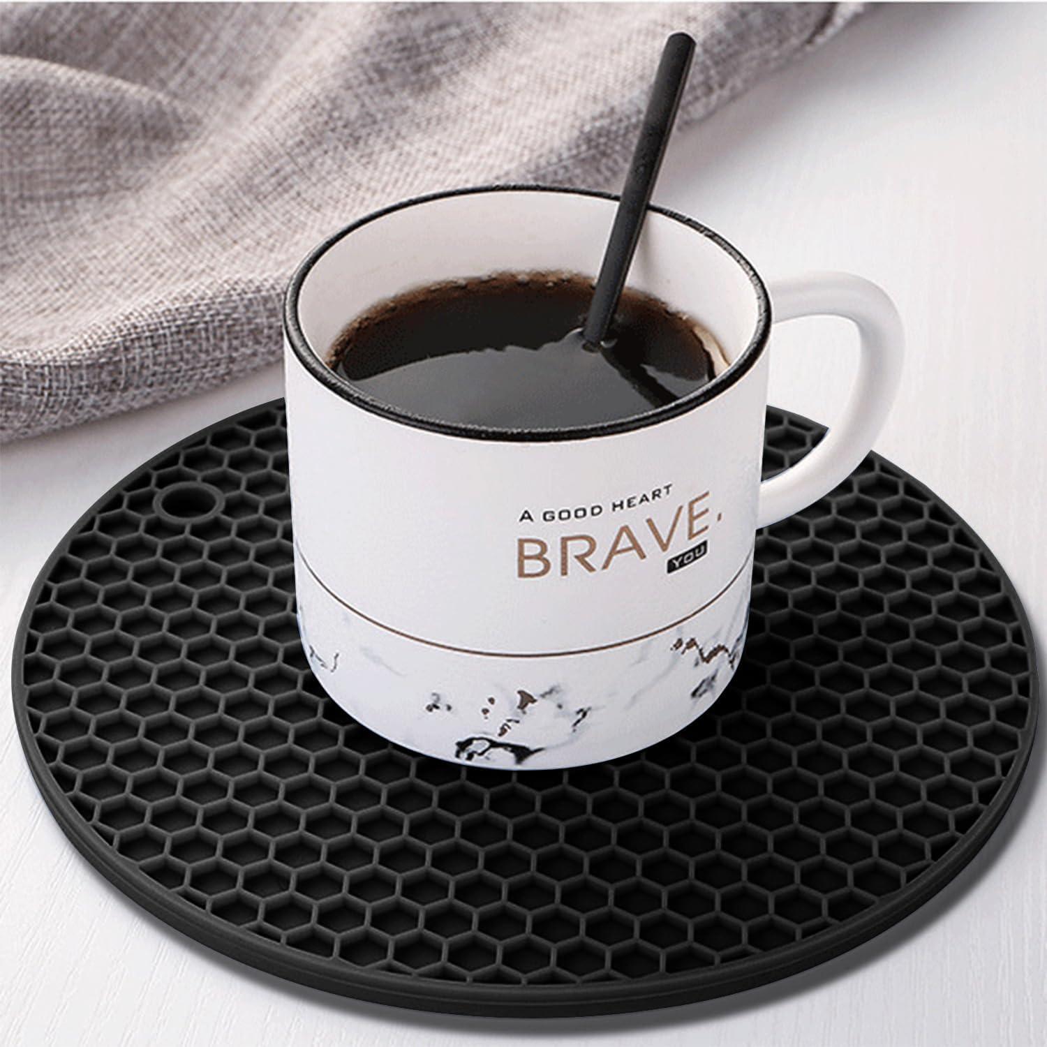 imageTENOC Silicone NonSlip Heat Resistant amp WaterTrapping Trivet Mats for Water Glasses amp Teacup amp Coffee Cup amp Dishes amp Cookware Multipurpose Kitchen Table Coaster 35Inch BlackBlack