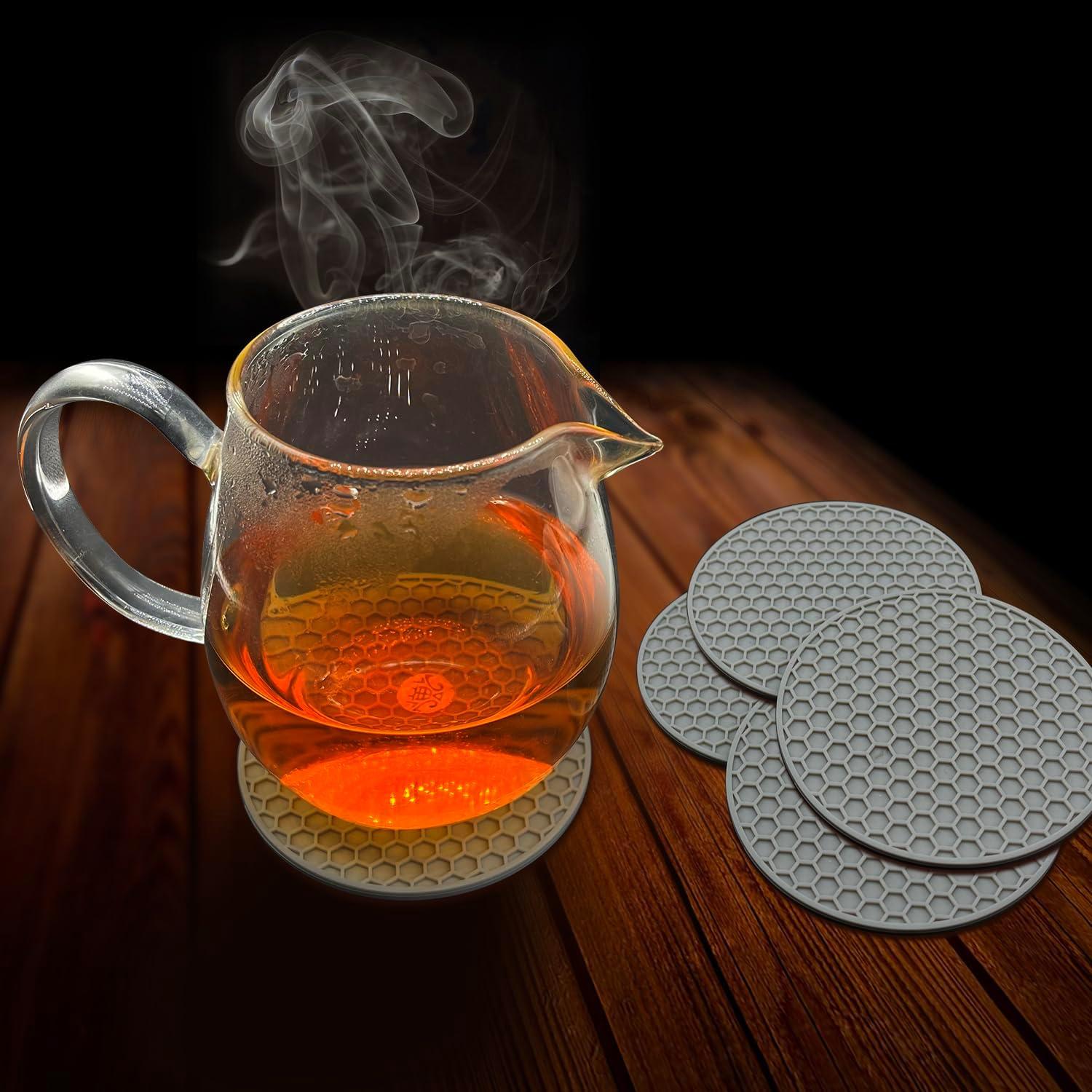 imageTENOC Silicone NonSlip Heat Resistant amp WaterTrapping Trivet Mats for Water Glasses amp Teacup amp Coffee Cup amp Dishes amp Cookware Multipurpose Kitchen Table Coaster 35Inch BlackGray