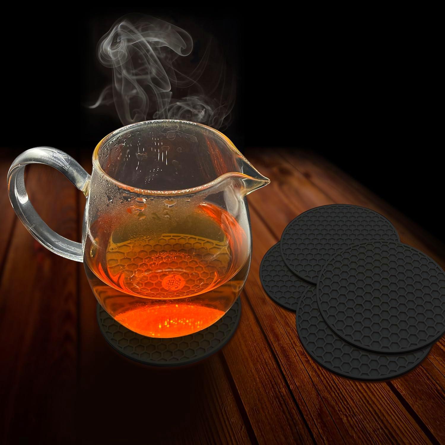 imageTENOC Silicone NonSlip Heat Resistant amp WaterTrapping Trivet Mats for Water Glasses amp Teacup amp Coffee Cup amp Dishes amp Cookware Multipurpose Kitchen Table Coaster 35Inch BlackBlack